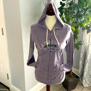 It’s very light sweater color purple with zipper on the front sizeS
